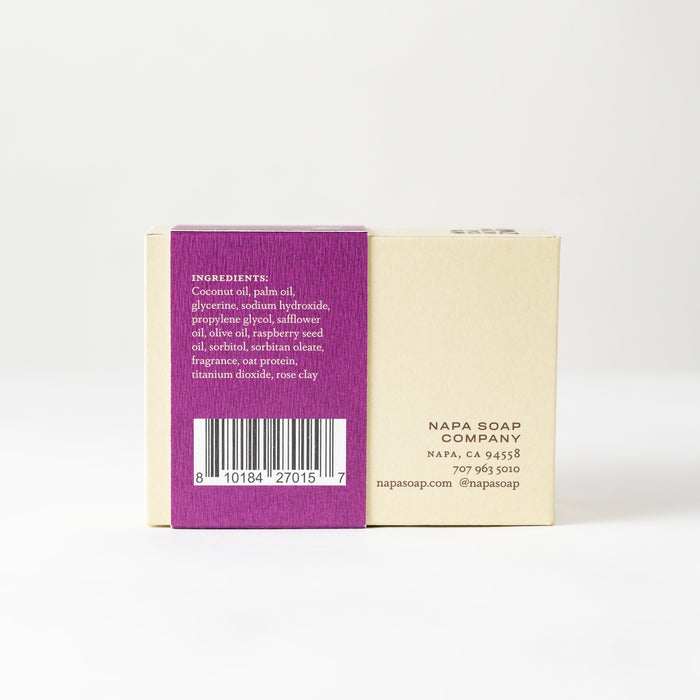 Bar of soap with a purple label on a white background