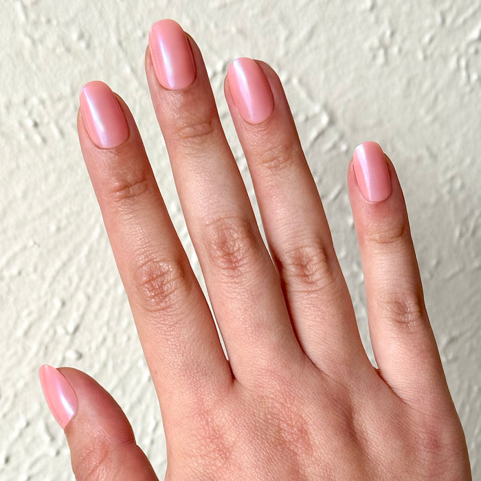 Olive Y'all | Short | Round - Tab Press-On with sheer bubble gum pink-blue iridescent false nails in a short round shape manicure