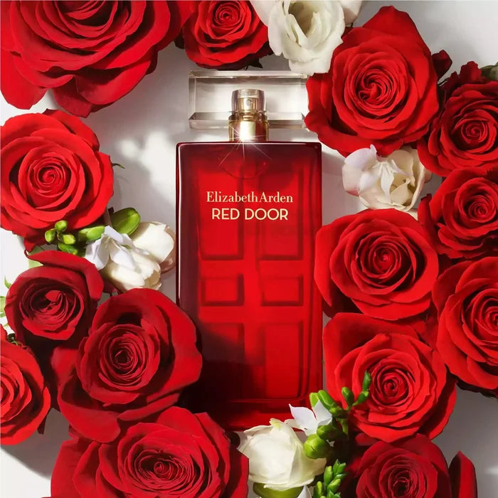 Red Door Eau de toilette surrounded by a bed of roses
