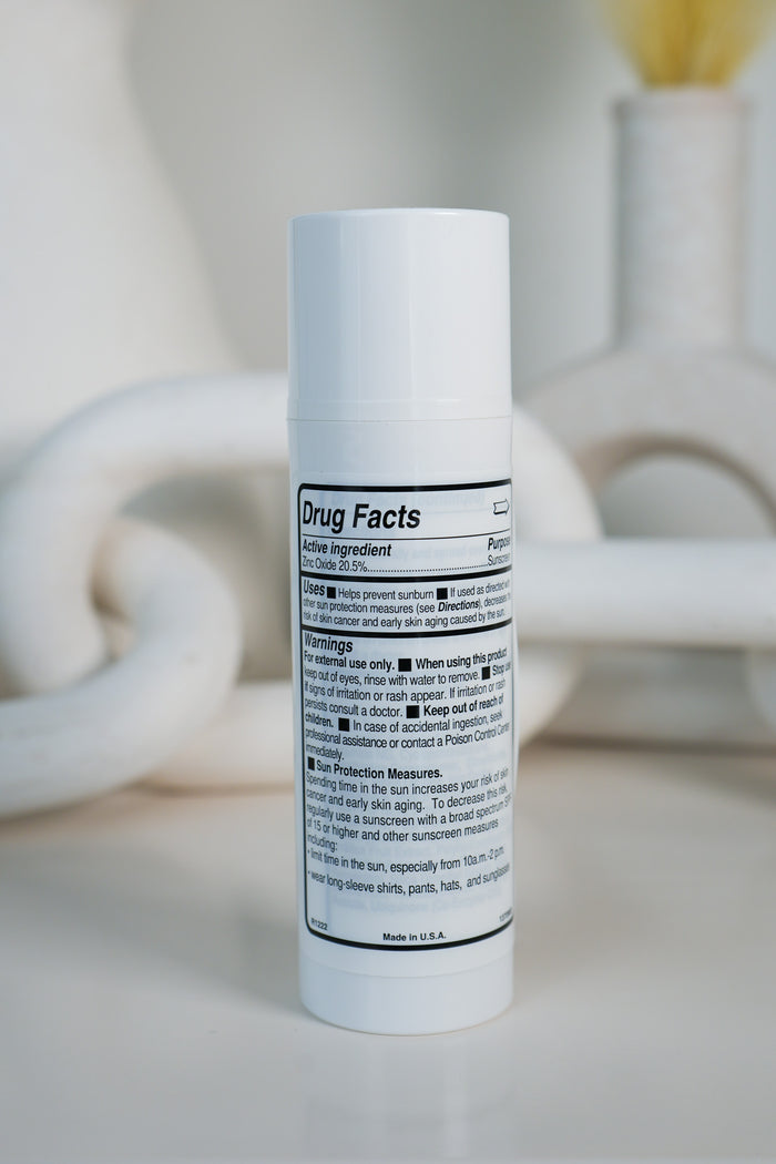 Tinted sunscreen product Lips & Drips Throwing Shade SPF50 side shot white packaging