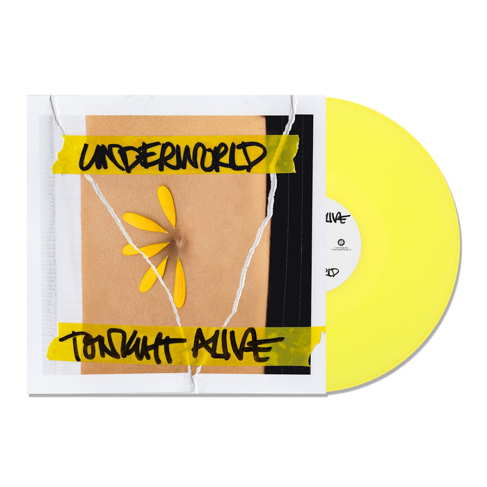 A yellow vinyl record partially in its sleeve. The Tonight Alive album cover features yellow tape with black text reading βTonight Alive,β and a daisy with missing petals on a brown background.