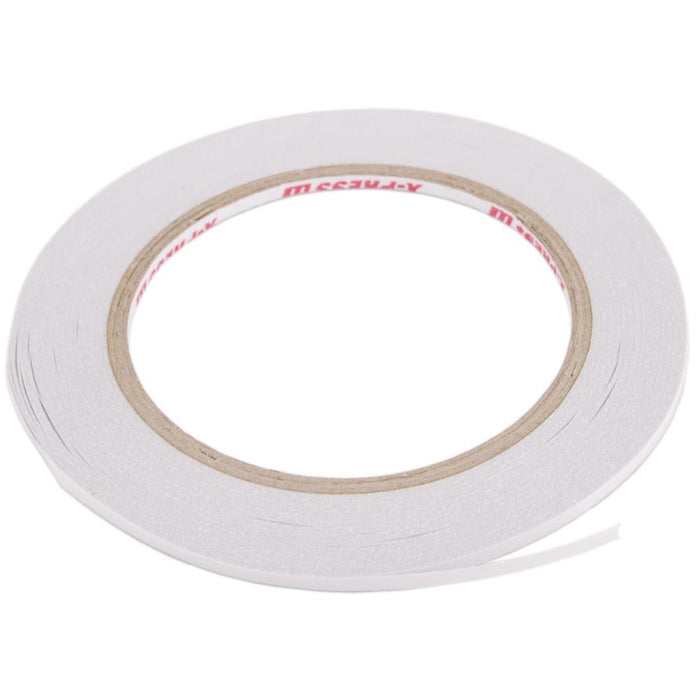 This Double Sided Tape is acid and solvent free; features an extra-strong adhesive that can be applied by hand and is heat resistant. Use on metal, glass, wood, paper, plastic, fabric and more! This roll contains one 27yd roll of 1/8in wide tape. Available at Embellish Away located in Bowmanville Ontario Canada.