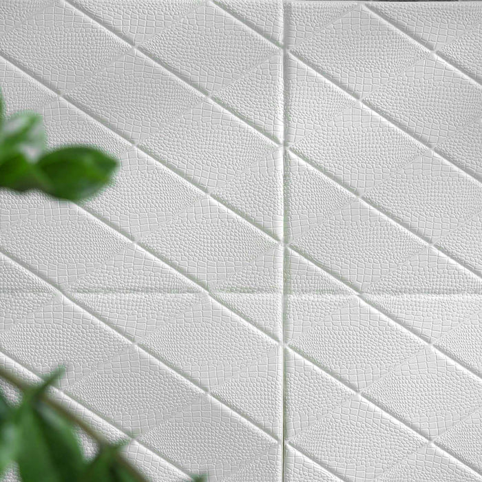 Textured white fabric with diamond pattern and subtle sheen.