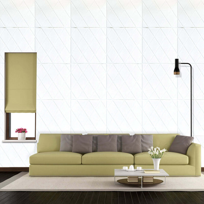 Modern green sofa in a stylish living room with a lamp and window.
