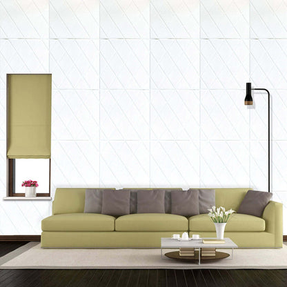 Modern green sofa in a stylish living room with a lamp and window.