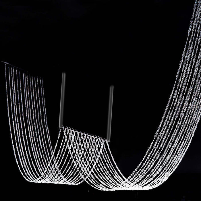 Crystal chandelier with cascading strands of beads.