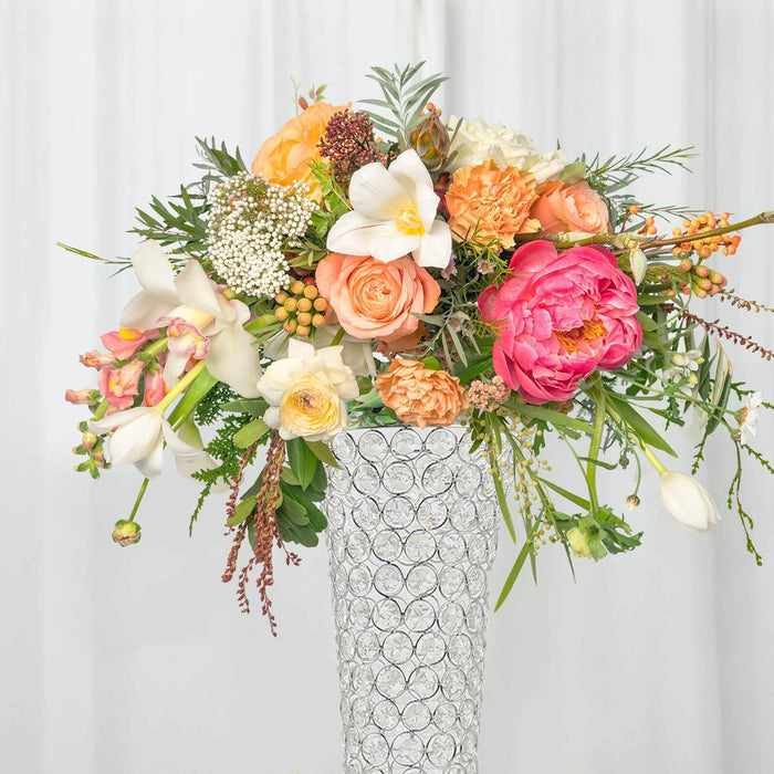 Colorful floral arrangement in a decorative vase.
