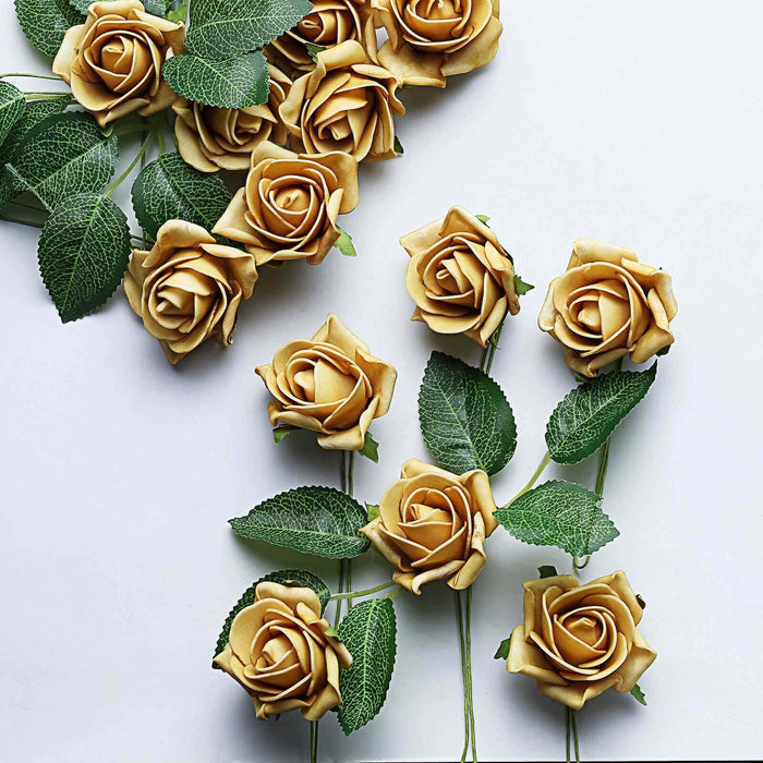 Yellow edible roses with green leaves on a white background