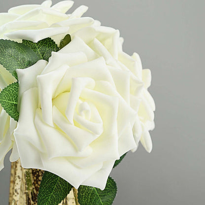 White artificial roses bouquet in a decorative vase.