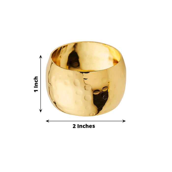Gold hammered ring, 2 inches wide and 1 inch tall.