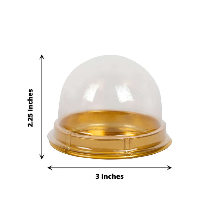 Clear plastic dome with a gold base, 3 inches wide and 2.25 inches tall.