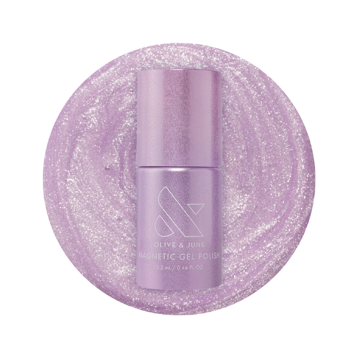 Olive and June Amethyst Velvet - Gel polish bottle on sparkling pastel lavender magnetic gel polish background