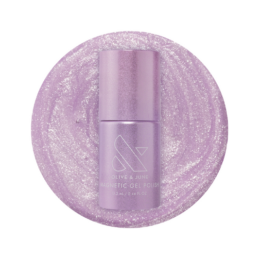 Olive and June Amethyst Velvet - Gel polish bottle on sparkling pastel lavender magnetic gel polish background
