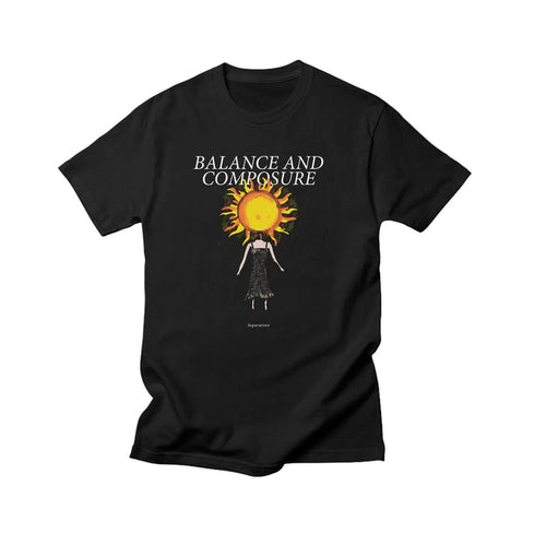 Balance And Composure black Comfort Colors tee featuring BALANCE AND COMPOSURE above a sun-headed figure graphic; Separation appears below the artwork.