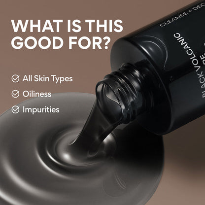 Volcanic Oil Cleanser tilted over a glossy pool of dark gel, with text on a warm taupe background. Visible text includes 'WHAT IS THIS GOOD FOR?' and bullet points for 'All Skin Types', 'Oiliness', and 'Impurities'.