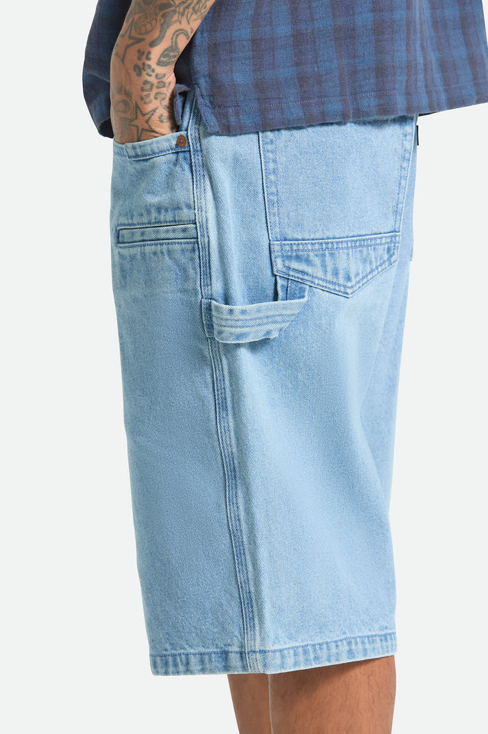 Men's Builders Carpenter Baggy Short in the color Washed Blue Denim - Men's Side View