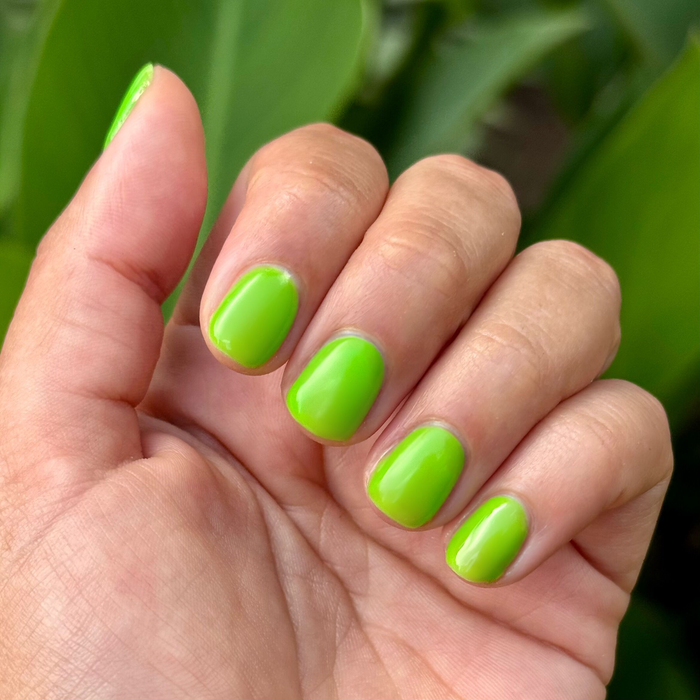 Cancel My Return Flight - Gel bright electric lime gel polish on natural nails with glossy smooth manicure finish