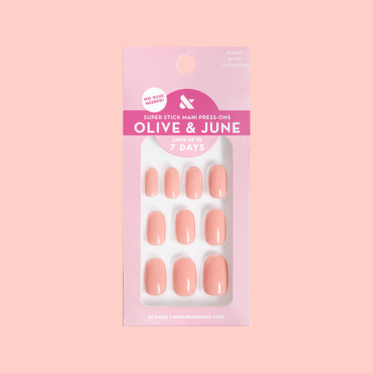 Pack of Carnation | Short | Round - Tab Press-On nails in soft pink for a quick, easy, and long-lasting at-home manicure.