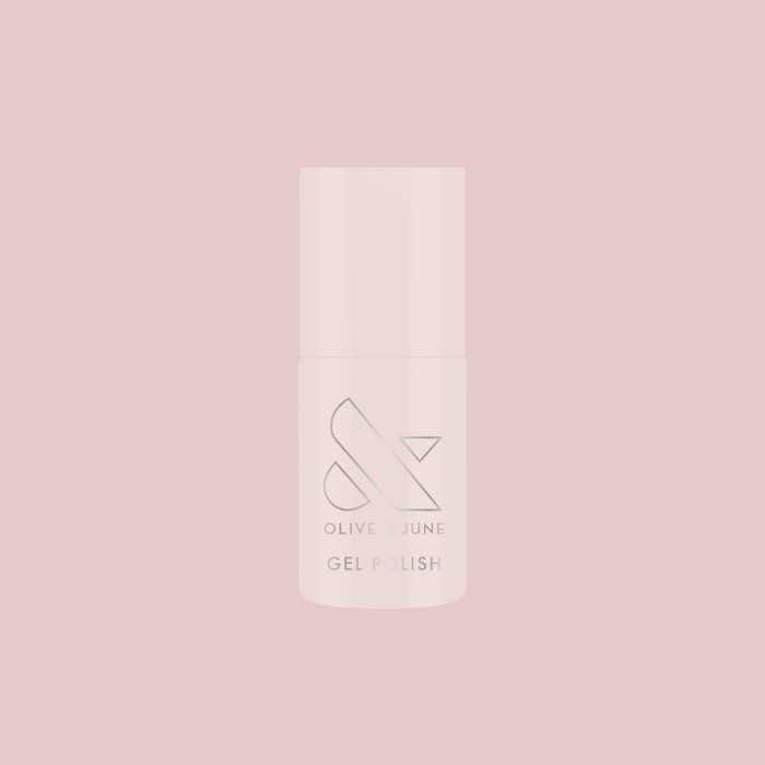 CCT - Gel polish bottle on a soft pink background for a feminine, sheer gel manicure by Olive and June