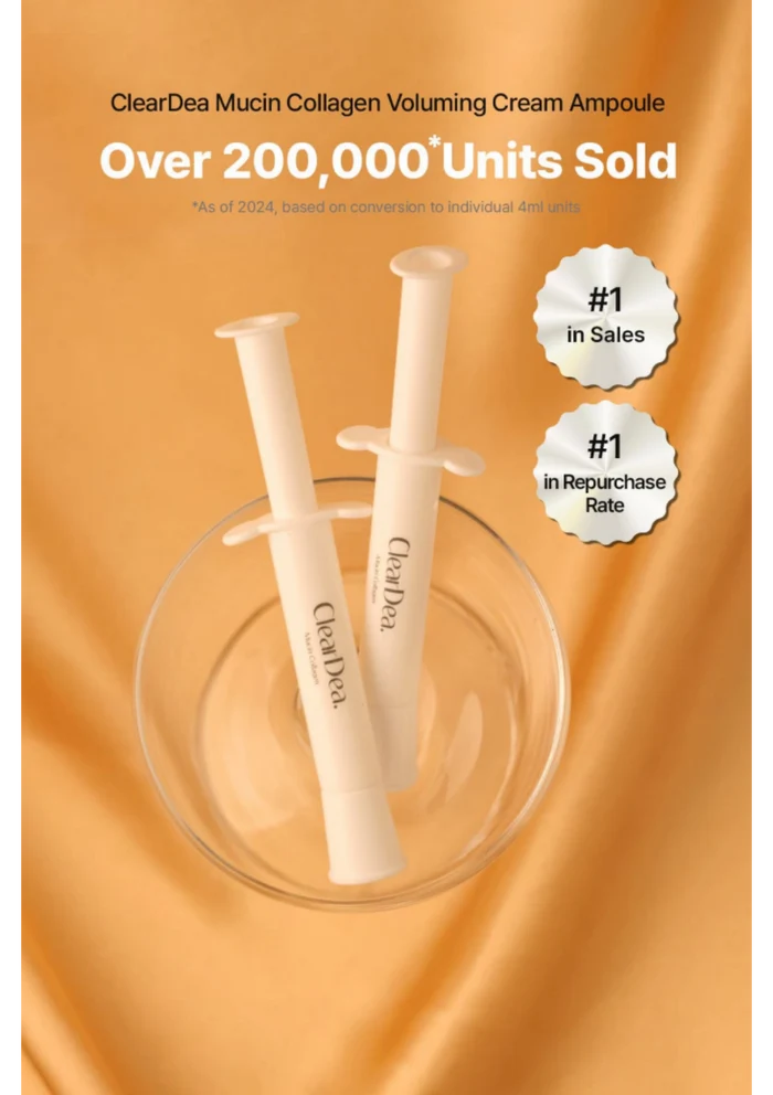 Two ClearDea Mucin Collagen Voluming Cream ampoules displayed in a clear glass bowl against a warm peach satin background, with promotional text and badge overlays.