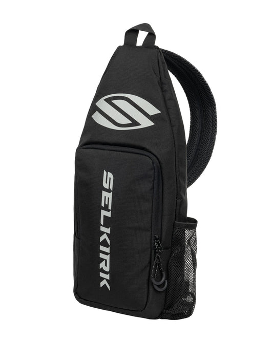 Black Selkirk sling backpack with vertical SELKIRK text, white logo and mesh side pocket