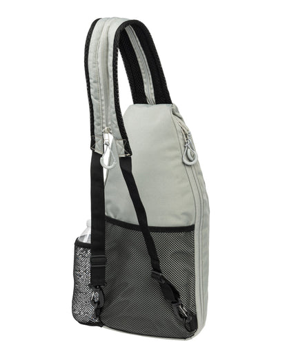 Side view of Core Line Pickleball Sling Bag in gray with padded shoulder strap, mesh water bottle pocket, and top zipper