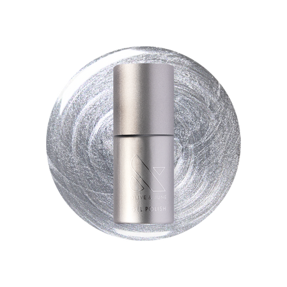 Cosmic Silver - Gel bottle shown on a metallic silver polish background for a long-lasting mani by Olive and June