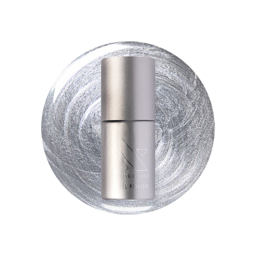 Cosmic Silver - Gel bottle shown on a metallic silver polish background for a long-lasting mani by Olive and June