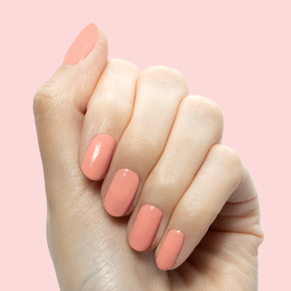 CS - Gel shown on nails in a smooth, floral coral peach shade for an easy at-home gel mani look