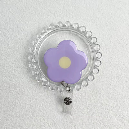 Daisy Retractable Badge Reel - Purple with Yellow Centre