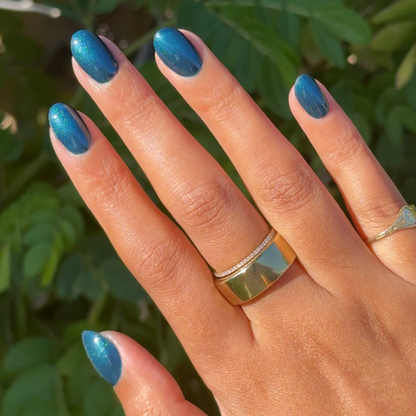 Dancing Green - Gel vibrant deep emerald blue gel polish manicure on medium-length rounded nails by Olive and June