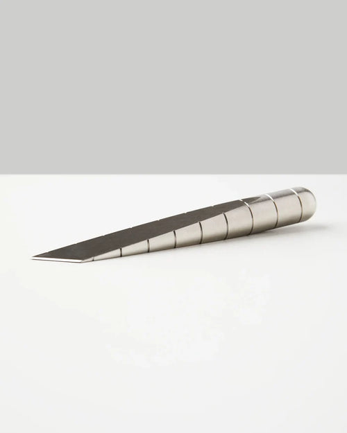 Stainless steel Craighill Desk Knife accessory with a sleek, modern design, ideal for cutting and opening tasks on a desk.