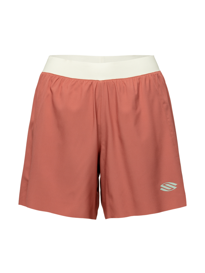 Front view of Essentials 2.0 womens performance shorts showcasing rust color, contrasting waistband, and Selkirk logo