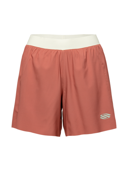 Front view of Essentials 2.0 womens performance shorts showcasing rust color, contrasting waistband, and Selkirk logo