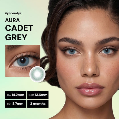 A close-up of a woman wearing EyeCandys Aura Cadet Grey contacts, with an inset of her eye and details: diameter 14.2mm, graphic diameter 13.6mm, base curve 8.7mm, lasts 3 months.