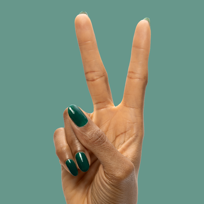 Fiddlefig - Gel polished nails in rich deep green creating a sleek, fresh manicure by Olive and June
