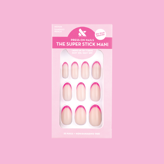 Flamingo French | Medium | Oval - Tab Press-On nails with neutral base and neon pink french tips for easy at-home manicure