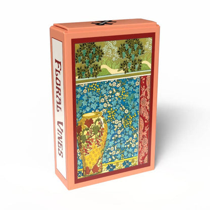 Inspired by E.A. Séguy’s intricate Art Deco puzzles, the Floral Vines | 99 Piece Jigsaw Puzzle from Penny Puzzle comes in a rectangular box featuring a vibrant floral pattern, a yellow vase illustration on the front, and “Floral Vines” printed on the side—evoking the nostalgia of vintage mini puzzle packaging.