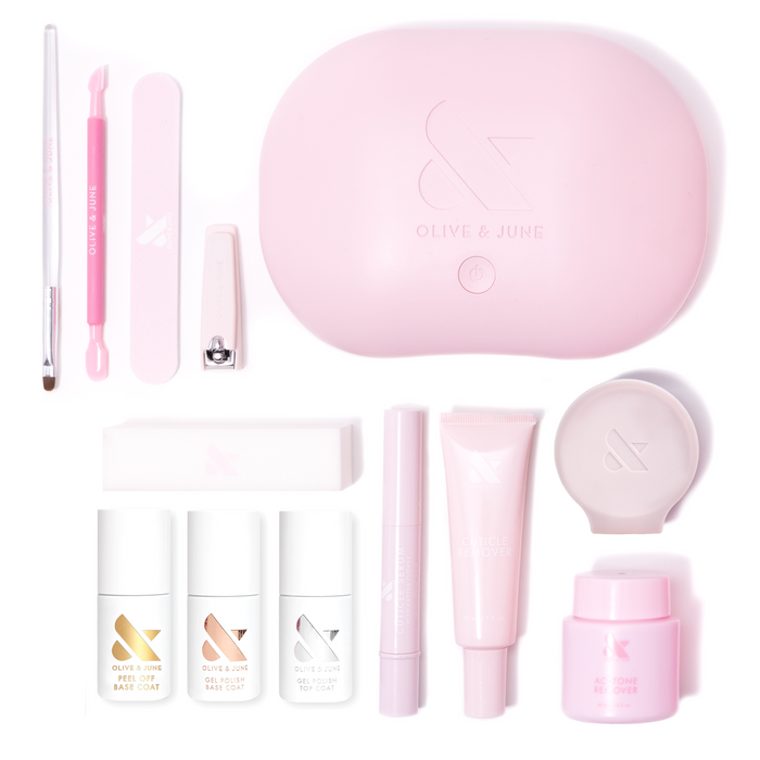 The Gel Mani System - 6 with pink UV lamp, nail care tools, base and top coats, cuticle remover, and polish remover for gel manicures