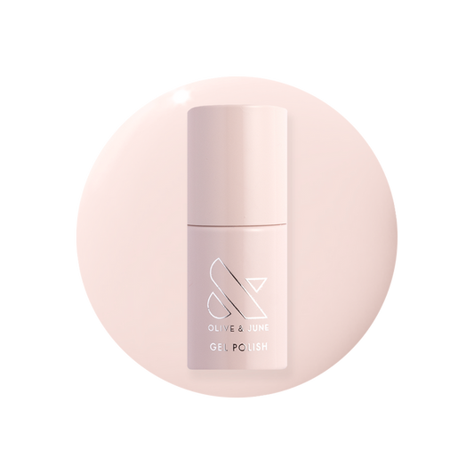 GH - Gel bottle of opaque baby pink gel polish by Olive and June for a glowy, versatile at-home manicure look