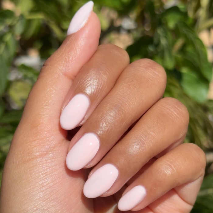 GH - Gel shown on natural nails with smooth, opaque baby pink polish for a glowy, versatile at-home manicure look