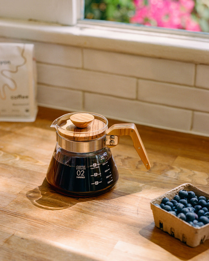 Glass coffee server with wood handle