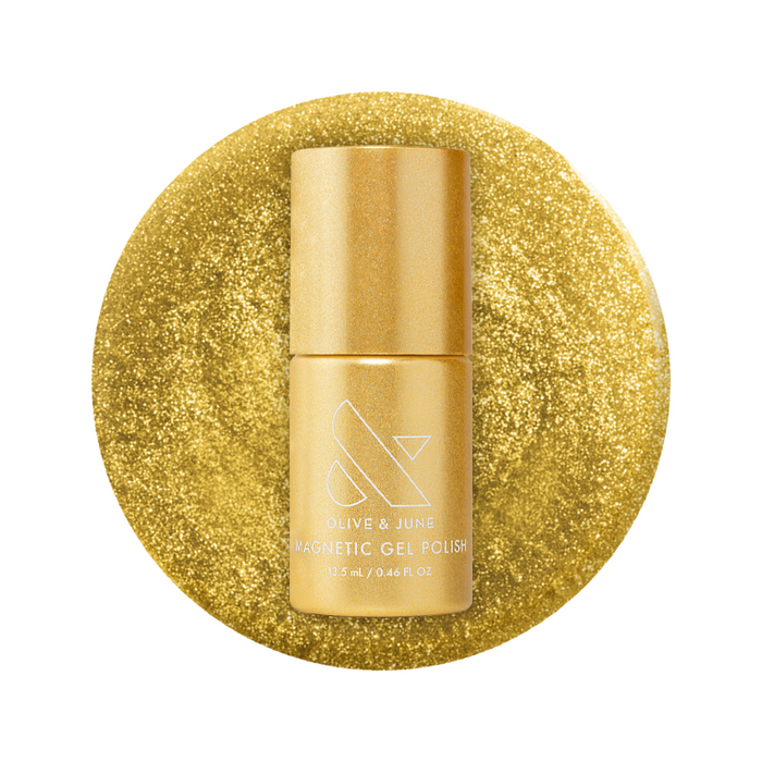 Golden Velvet - Gel bottle on shimmering golden bronze magnetic gel polish with metallic depth background