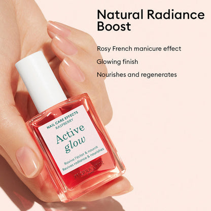 A hand holds a bottle of Manucurist’s Healthy Glow Duo, with benefits—rosy French manicure effect, glowing finish, nourishes like a nail serum, and regenerates—listed beside it on a light pink background.