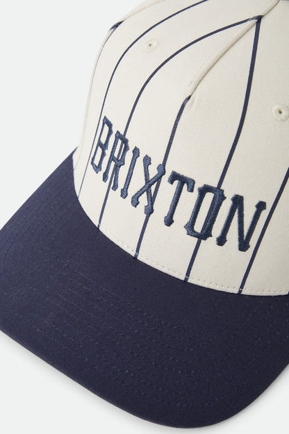 Unisex Homerun Snapback in the color Off White/Washed Navy - Additional Laydown image