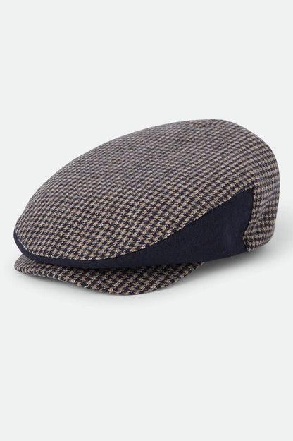 Unisex Hooligan Flat Cap in the color Navy/Sand Houndstooth - Front Product View