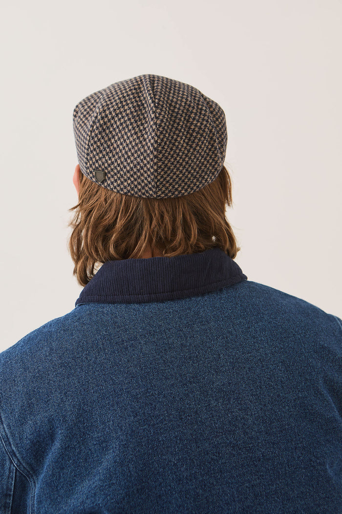 Unisex Hooligan Flat Cap in the color Navy/Sand Houndstooth - Men's Back View