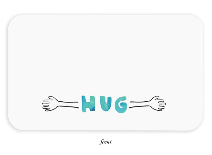 White note card with rounded corners and teal 'HUG' between hand icons