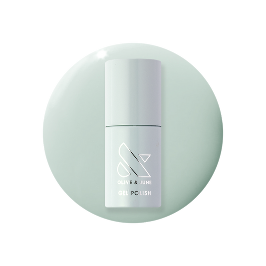 KMC - Gel bottle displayed on a soft sage green background representing a long-lasting gel polish by Olive and June