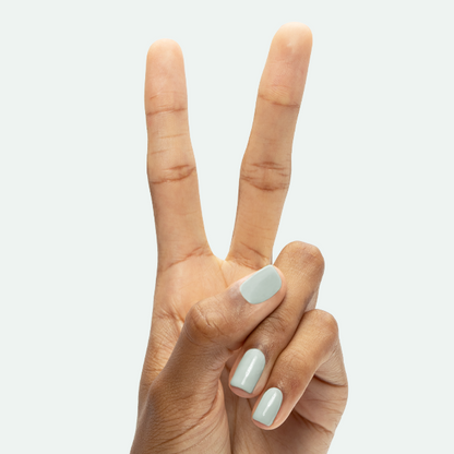 KMC - Gel shown on hand with nails painted in a smooth sage green shade for a fresh gel manicure by Olive and June
